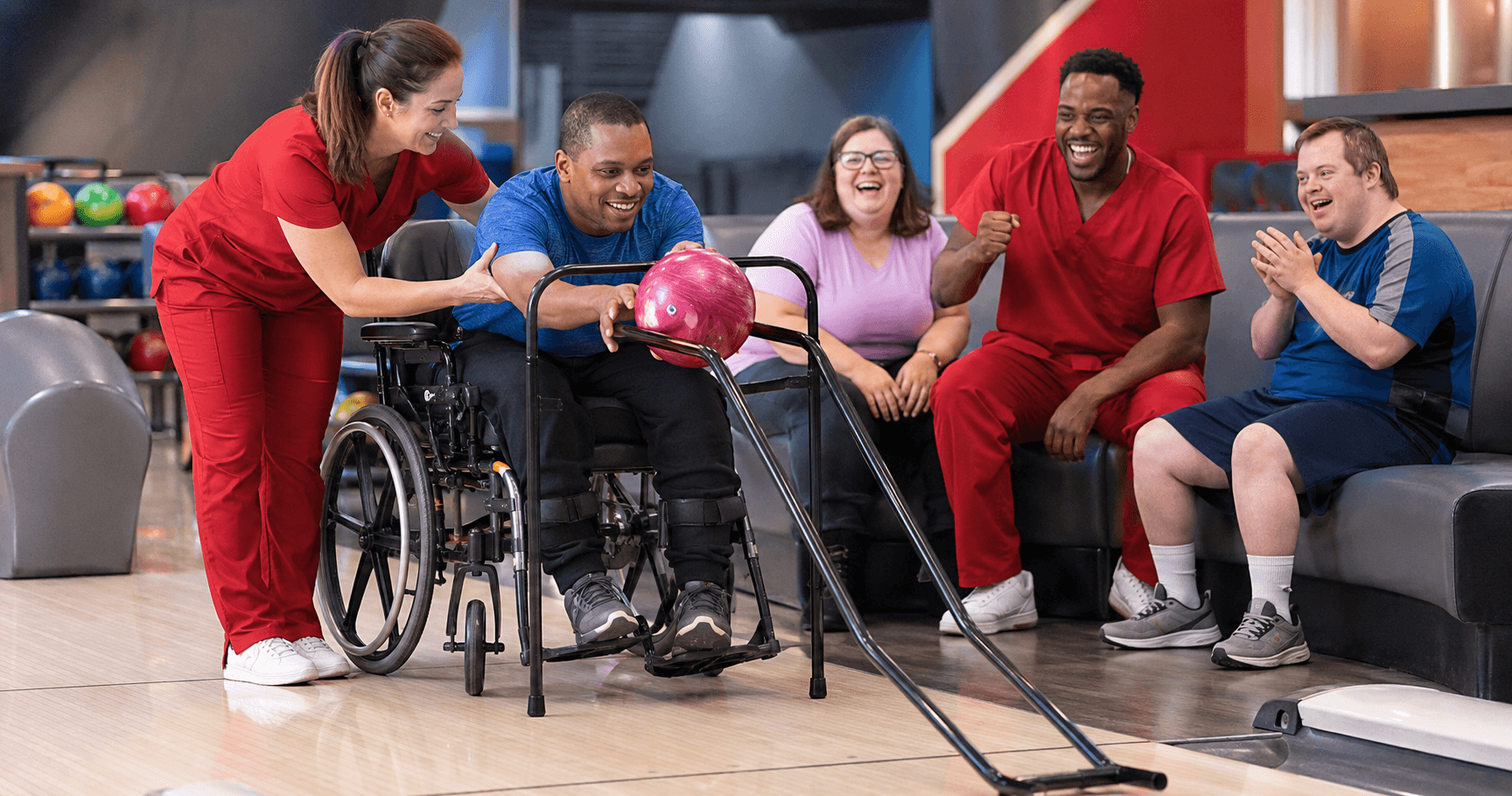 Complete Home Care staff and the individuals they support enjoying a community bowling outing
